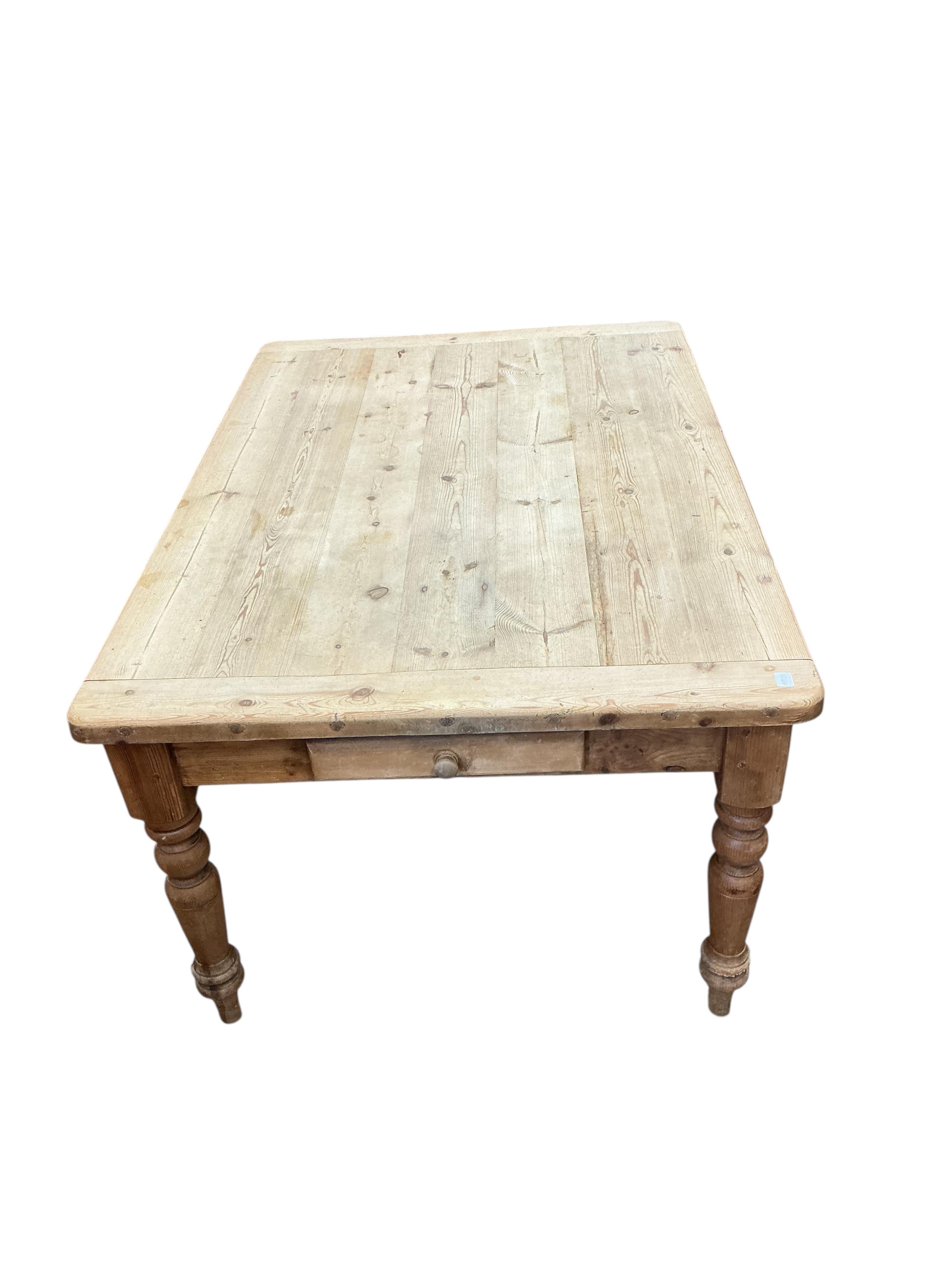 A Victorian style pine kitchen table, fitted two drawers, width 152cm, depth 106cm, height 78cm